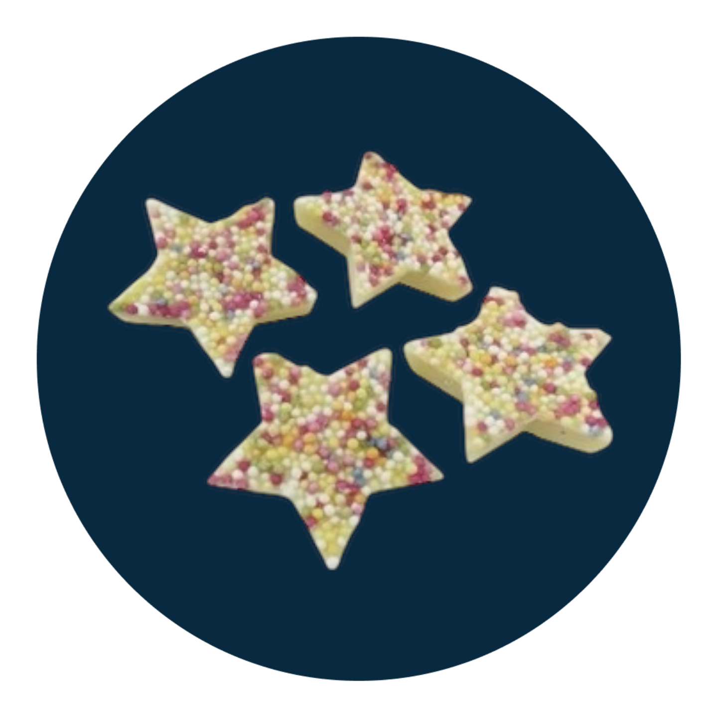 Star-shaped white chocolate discs with colourful sprinkles