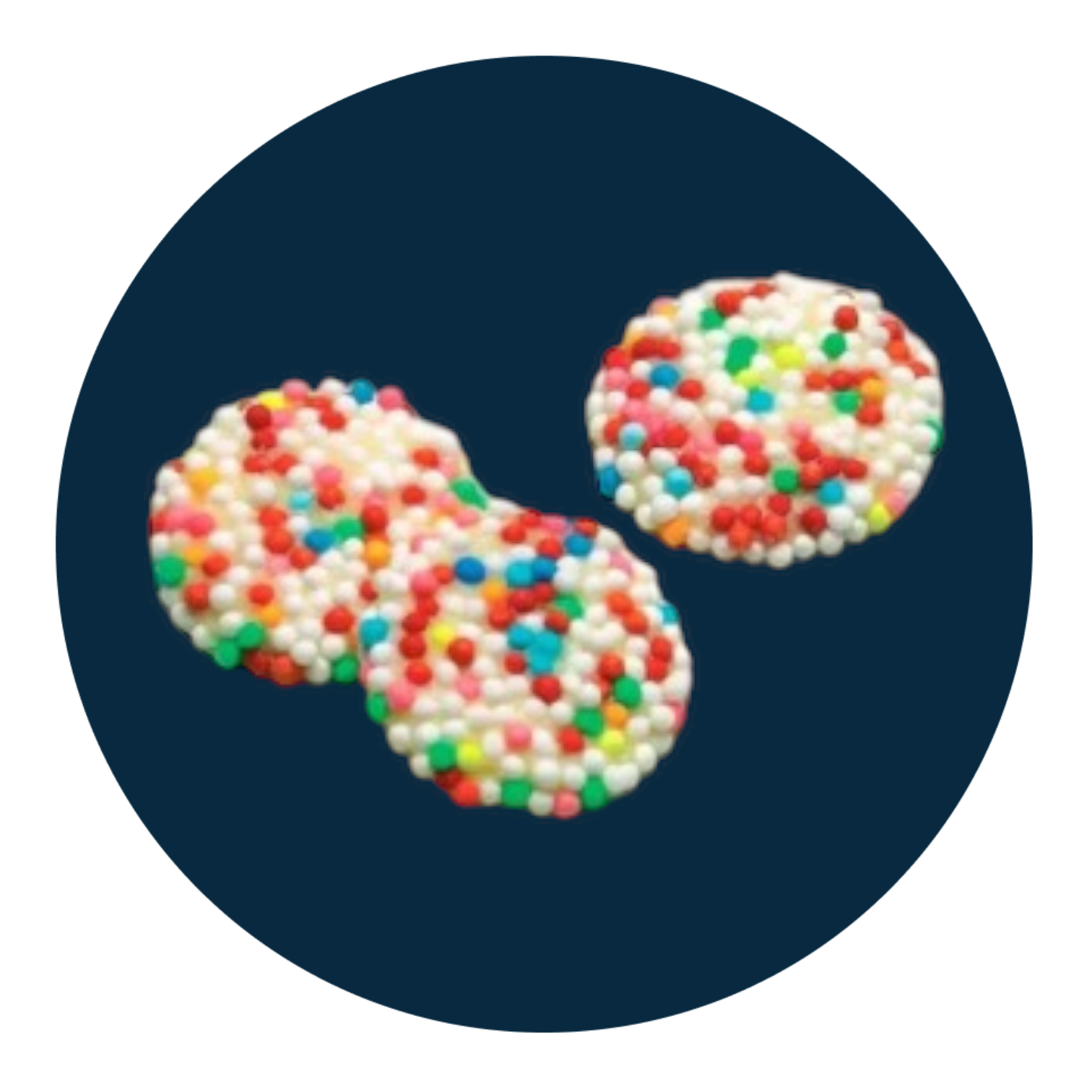 White chocolate discs topped with colourful sprinkles